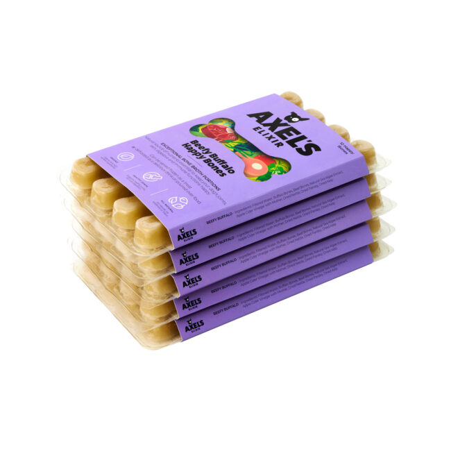 Studio product photography of stacked dog treat packs for a commercial pet food brand campaign Axels Elixer