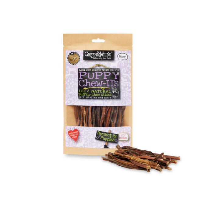 Studio product photography of puppy chew treats in branded packaging for a commercial pet food campaign for green & wilds