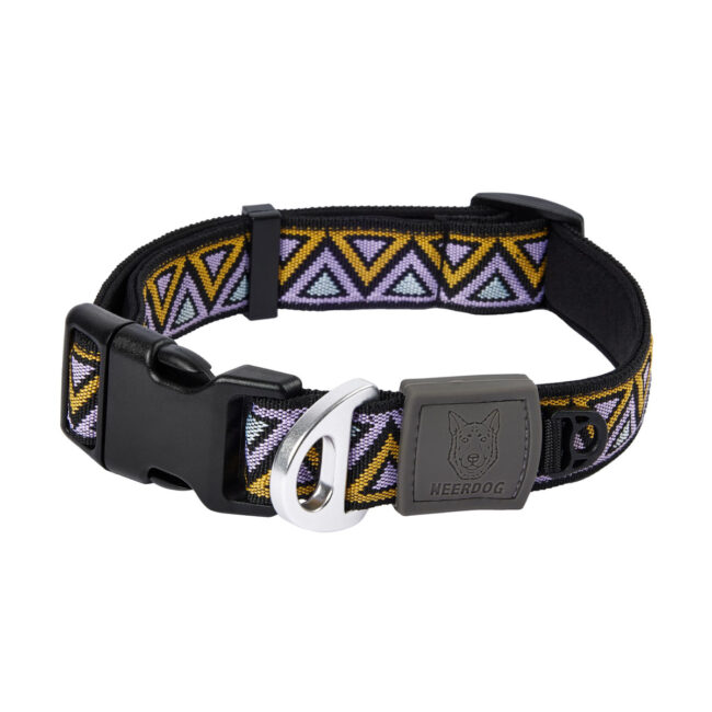 Studio product photography of a dog collar with patterned fabric and buckle for a commercial pet brand Neerdog